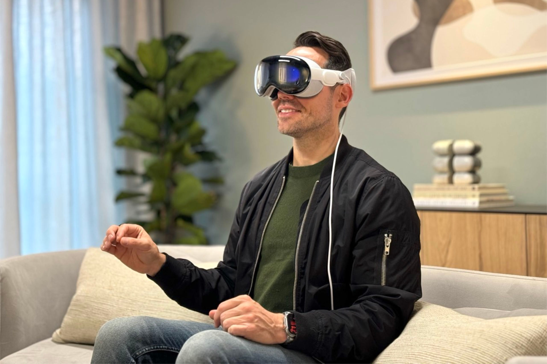 Apple Vision Pro user with VR headset